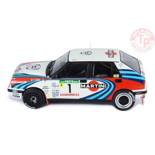 LANCIA DELTA HF INTEGRALE MARTINI 16V N1 M.BIASION-T.SIVIERO WINNER RALLY OF PORTUGAL 1990 - 1:18 IXO MODELS 18RMC064A.20 IXO...