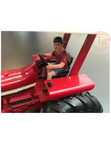 Teenager Jeff driving tractor AT32141 AT COLLECTIONS
