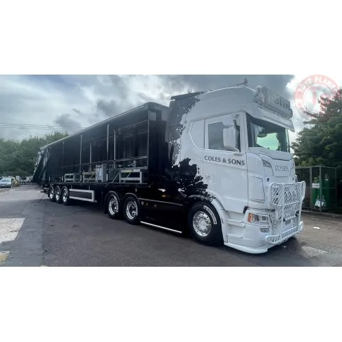 Scania Next Gen S-serie Highline met 3-assige schuifzeilen oplegger Coles - Bruce Lee TEKNO 84971 TEKNO