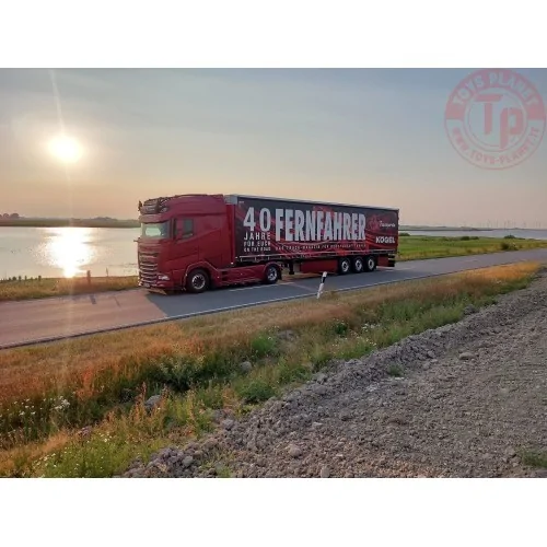 DAF XG+ met 3-assige schuifzeilenoplegger Fernfahrer 40 Jahre TEKNO 86038 TEKNO