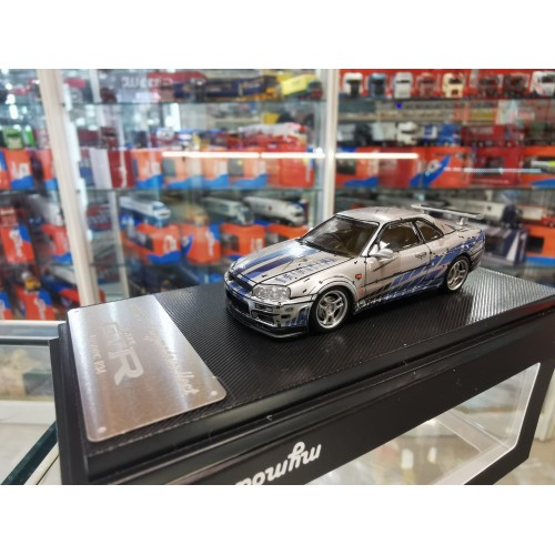 1/64 NISSAN SKYLINE GT-R R34 V-SPEC GRIGIA/BLU MC640009I MODELCOLLECT