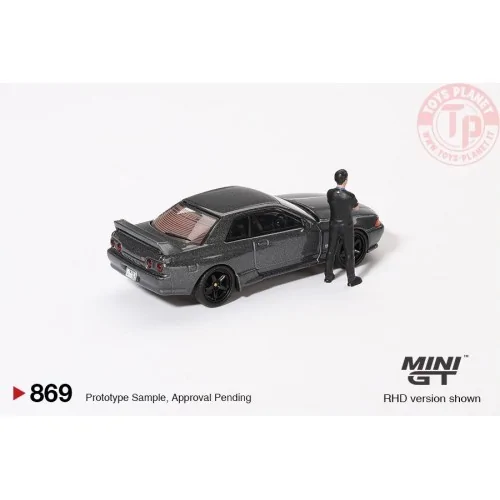 NISSAN SKYLINE GT-R (R32) NISMO NISMO GUNMETAL WITH TSUGIO MATSUDA FIGURE 1992 1:64 MGT00869-R MINI GT