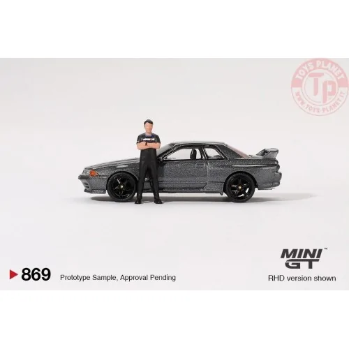 NISSAN SKYLINE GT-R (R32) NISMO NISMO GUNMETAL WITH TSUGIO MATSUDA FIGURE 1992 1:64 MGT00869-R MINI GT