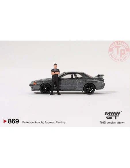 NISSAN SKYLINE GT-R (R32) NISMO NISMO GUNMETAL WITH TSUGIO MATSUDA FIGURE 1992 1:64 MGT00869-R MINI GT