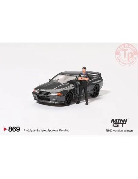NISSAN SKYLINE GT-R (R32) NISMO NISMO GUNMETAL WITH TSUGIO MATSUDA FIGURE 1992 1:64 MGT00869-R MINI GT