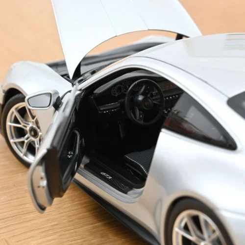 1/18 PORSCHE 911 GT3 W/TOURING PACK 2025 GT SILVERMETALLIC NV187002 NOREV